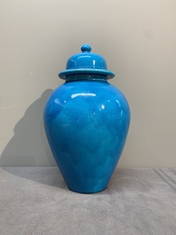 Three Chinese turquoise-glazed covered vases and a lavender-blue-glazed vase, Kangxi mark, 19/20th C.