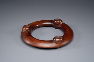 A Chinese Longquan celadon tripod censer on wooden stand, Yuan/Ming