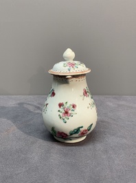 A Chinese famille rose tea caddy, two covered milk jugs and three vases, Yongzheng/Qianlong