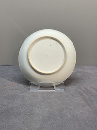 A Chinese famille rose 'Lowestoft' teapot, a plate, three cups and nine saucers, Qianlong