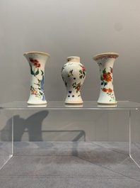 A Chinese famille rose tea caddy, two covered milk jugs and three vases, Yongzheng/Qianlong