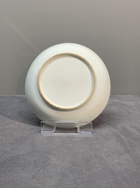 A Chinese famille rose 'Lowestoft' teapot, a plate, three cups and nine saucers, Qianlong