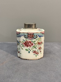 A Chinese famille rose tea caddy, two covered milk jugs and three vases, Yongzheng/Qianlong