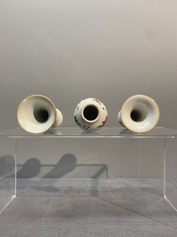 A Chinese famille rose tea caddy, two covered milk jugs and three vases, Yongzheng/Qianlong