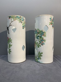 A pair of Chinese famille rose hat stands with birds among flowering branches, signed Zhu Shaoquan 朱少泉, dated 1892