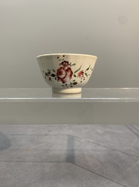 A Chinese famille rose 'Lowestoft' teapot, a plate, three cups and nine saucers, Qianlong
