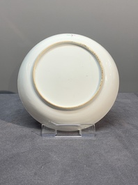 A Chinese famille rose 'Lowestoft' teapot, a plate, three cups and nine saucers, Qianlong