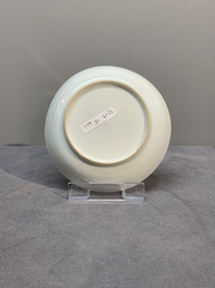 A Chinese famille rose 'Lowestoft' teapot, a plate, three cups and nine saucers, Qianlong