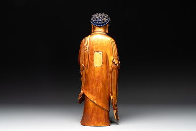 A fine Chinese gilt-lacquered wooden figure of the standing Buddha, Ming