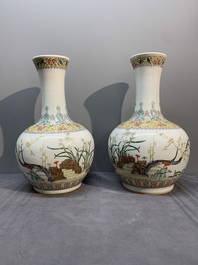A pair of Chinese famille rose bottle vases with flowers, Qianlong mark, Republic