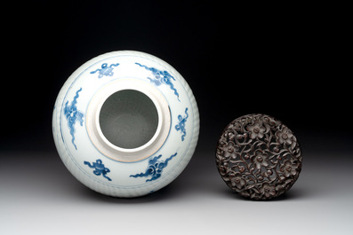 A Chinese blue and white 'playing boys' vase and wooden cover, Kangxi