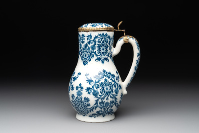 A fine blue and white Dutch Delft gilt-silver-mounted ewer and cover in the style of Daniel Marot, ca. 1700