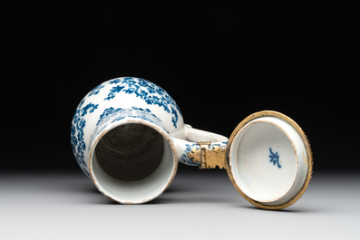 A fine blue and white Dutch Delft gilt-silver-mounted ewer and cover in the style of Daniel Marot, ca. 1700