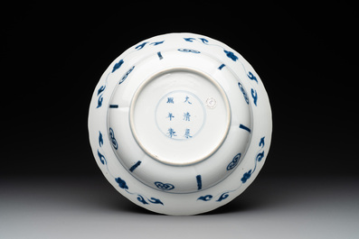 A Chinese blue and white 'warriors on horseback' 'klapmuts' bowl, Kangxi mark and of the period