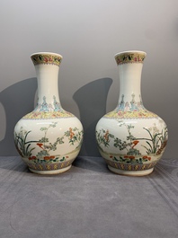 A pair of Chinese famille rose bottle vases with flowers, Qianlong mark, Republic