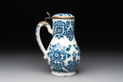 A fine blue and white Dutch Delft gilt-silver-mounted ewer and cover in the style of Daniel Marot, ca. 1700
