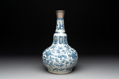 A Chinese blue and white pear-shaped vase with an Islamic market metal mount, Ming