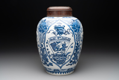 A Chinese blue and white jar and wooden cover, Kangxi