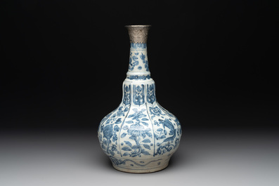 A Chinese blue and white pear-shaped vase with an Islamic market metal mount, Ming