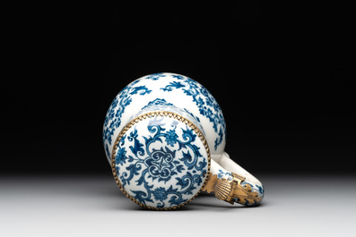 A fine blue and white Dutch Delft gilt-silver-mounted ewer and cover in the style of Daniel Marot, ca. 1700