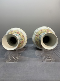 A pair of Chinese famille rose bottle vases with flowers, Qianlong mark, Republic