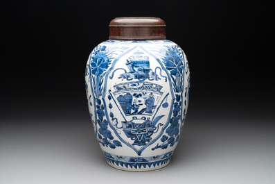 A Chinese blue and white jar and wooden cover, Kangxi
