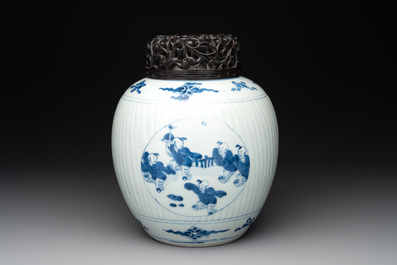 A Chinese blue and white 'playing boys' vase and wooden cover, Kangxi