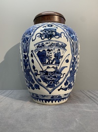 A Chinese blue and white jar and wooden cover, Kangxi