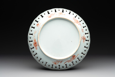 A rare Chinese famille rose cup and a gilt-decorated iron-red, blue and white plate with reticulated border, Kangxi/Qianlong
