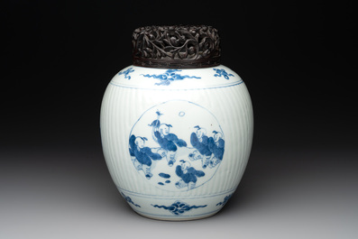 A Chinese blue and white 'playing boys' vase and wooden cover, Kangxi