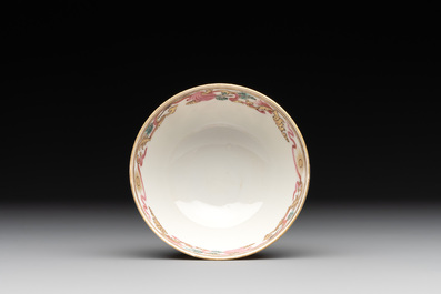 A rare Chinese famille rose cup and a gilt-decorated iron-red, blue and white plate with reticulated border, Kangxi/Qianlong