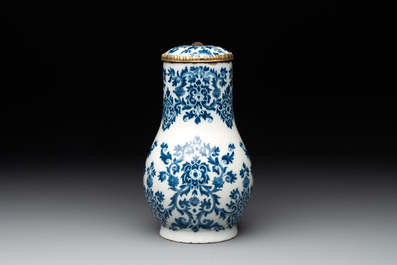 A fine blue and white Dutch Delft gilt-silver-mounted ewer and cover in the style of Daniel Marot, ca. 1700
