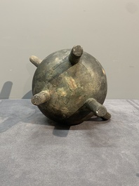 A Chinese inscribed archaic bronze tripod ritual wine vessel and cover, 'He 盉', Western Zhou