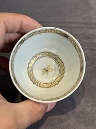 A fine Chinese gilt-decorated grisaille 'Xi Xiang Ji' cup and saucer, Yongzheng