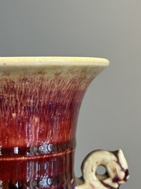 A Chinese flamb&eacute;-glazed vase with archaistic dragon handles, 19th C.