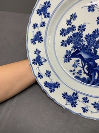 A Chinese blue and white dish with floral design, Kangxi mark and of the period