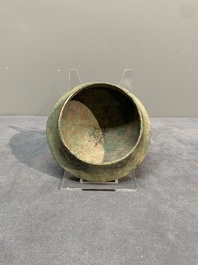 A Chinese inscribed archaic bronze tripod ritual wine vessel and cover, 'He 盉', Western Zhou