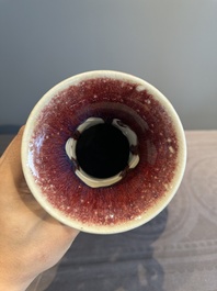 A Chinese flamb&eacute;-glazed vase with archaistic dragon handles, 19th C.