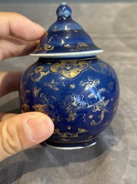A Chinese gilt-decorated powder-blue bowl and a covered jarlet, Kangxi/Qianlong