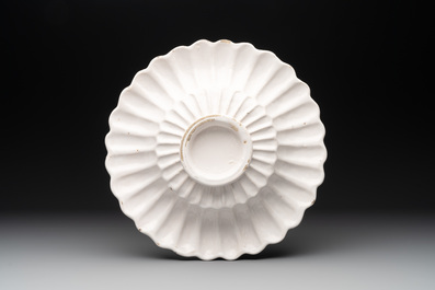 A fine white Dutch Delft gadrooned dish, 17th C.