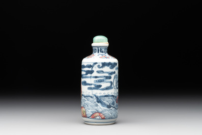 A Chinese blue, white and copper-red 'Journey to the West' snuff bottle, Yongzheng mark, 19th C.