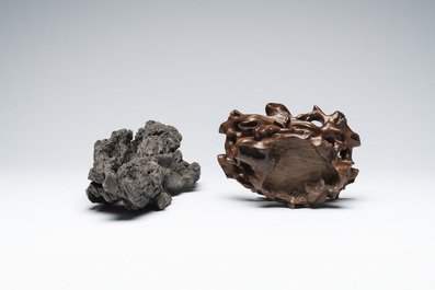 A Chinese ying stone scholar's rock on wooden stand, 20th C.