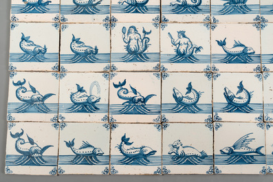 A field of 30 Dutch Delft blue and white tiles with sea creatures and ships, 18th C.