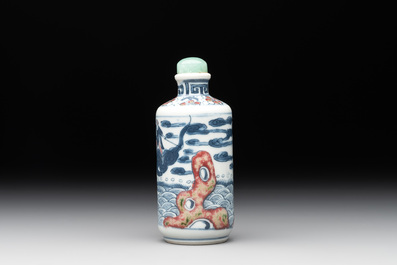 A Chinese blue, white and copper-red 'Journey to the West' snuff bottle, Yongzheng mark, 19th C.