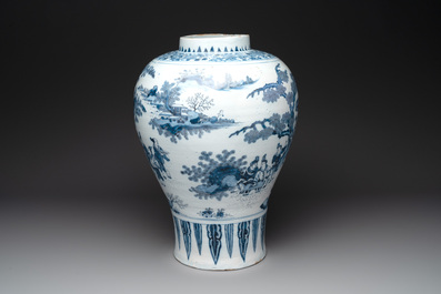 A very large Dutch Delft blue and white chinoiserie baluster vase, last quarter 17th C.