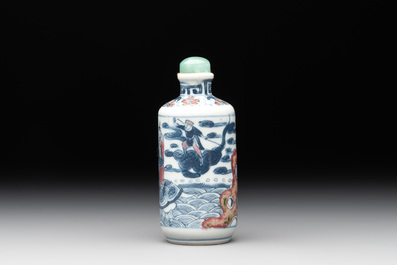 A Chinese blue, white and copper-red 'Journey to the West' snuff bottle, Yongzheng mark, 19th C.