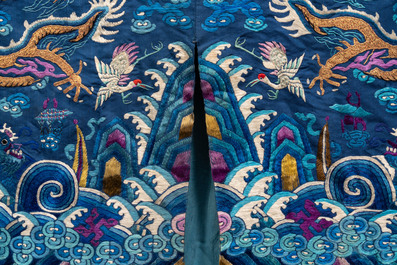 A Chinese gold thread embroidered blue-ground silk 'dragon' robe, 19th C.