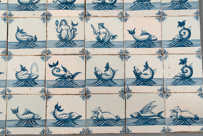 A field of 30 Dutch Delft blue and white tiles with sea creatures and ships, 18th C.