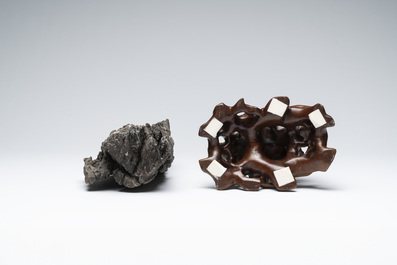 A Chinese ying stone scholar's rock on wooden stand, 20th C.