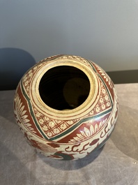 A Chinese Swatow green- and red-enamelled 'dragon' jar and a pair of covered bowls, Ming
